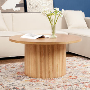 Stavros whitewashed wooden round deals coffee table